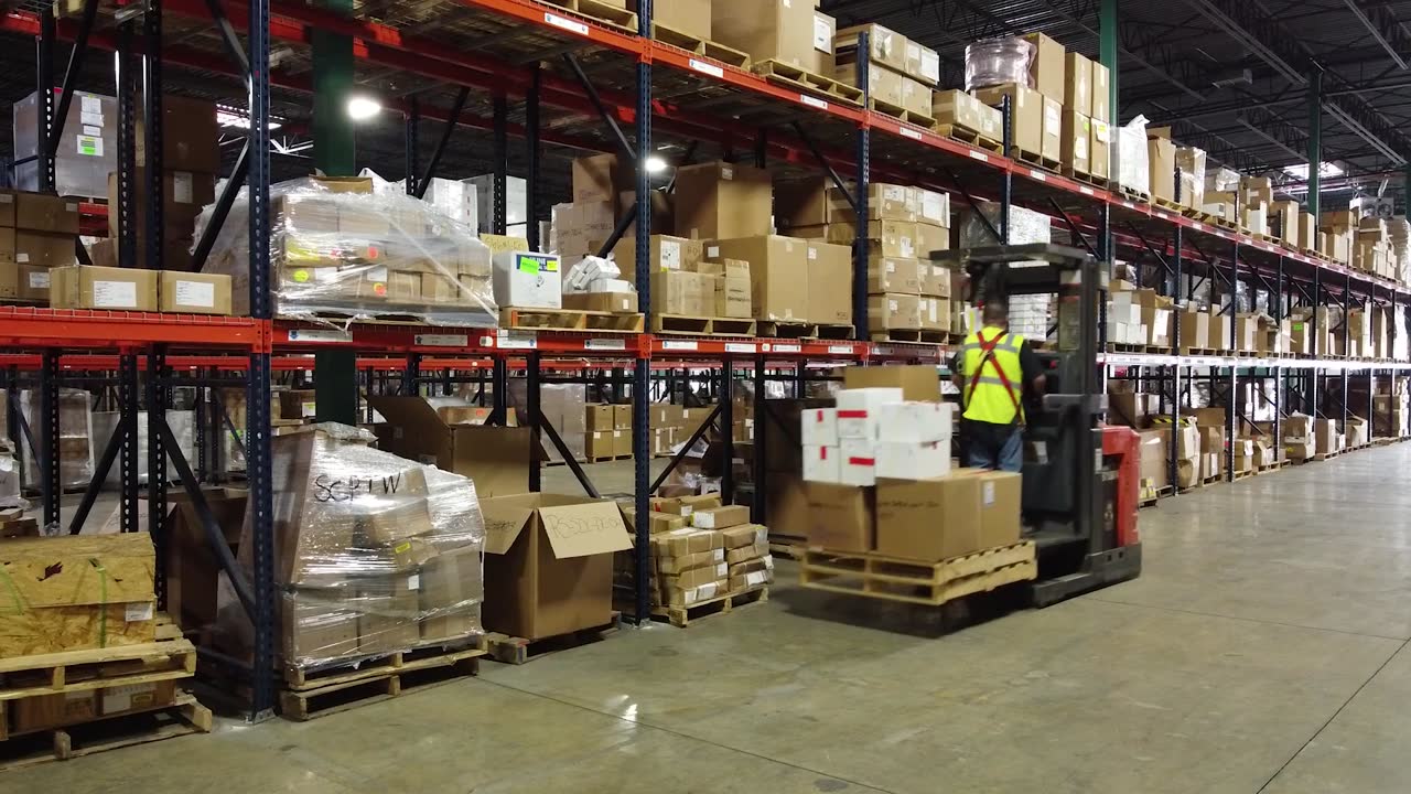Warehouse with racks and a forklift